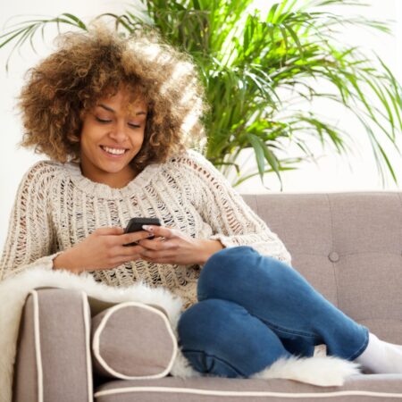 California woman enjoying California LifeLine free government phone service